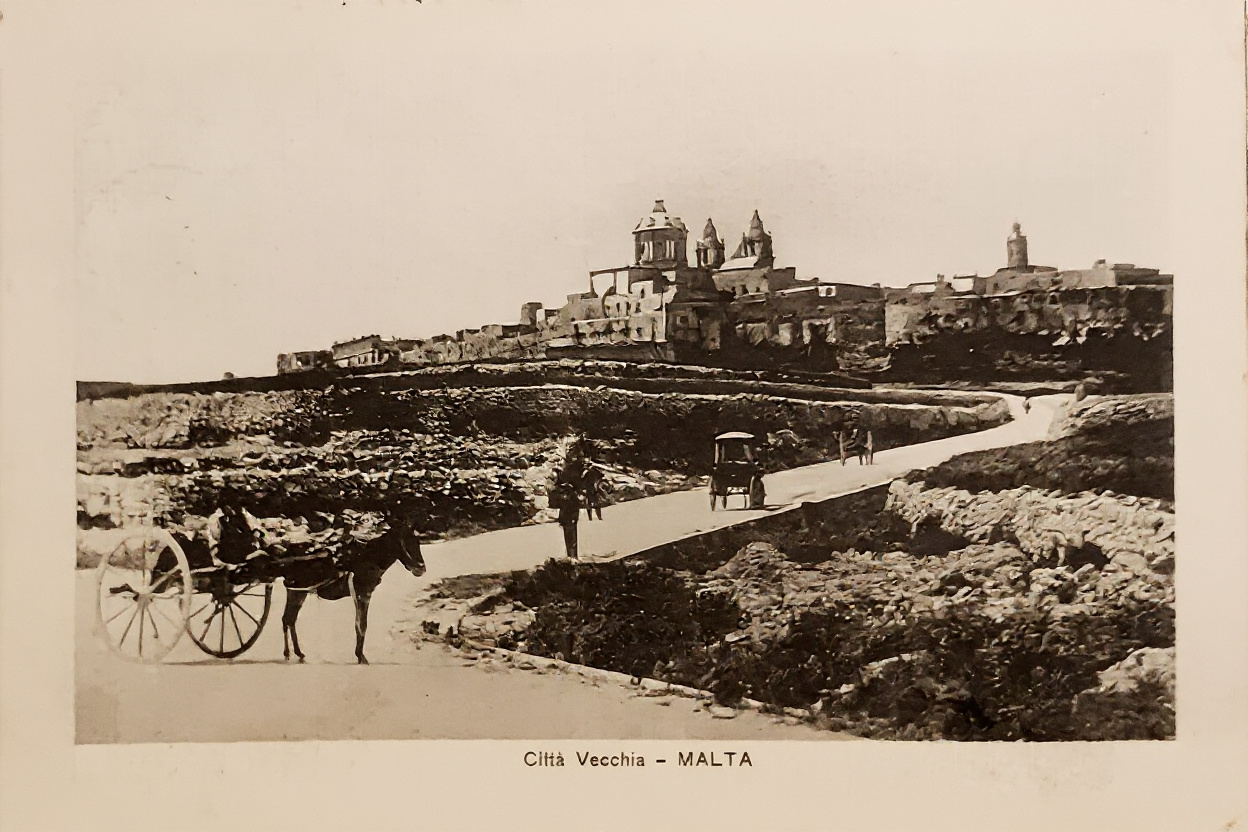 Before and after AI restoration of a 1920s Malta street postcard — After